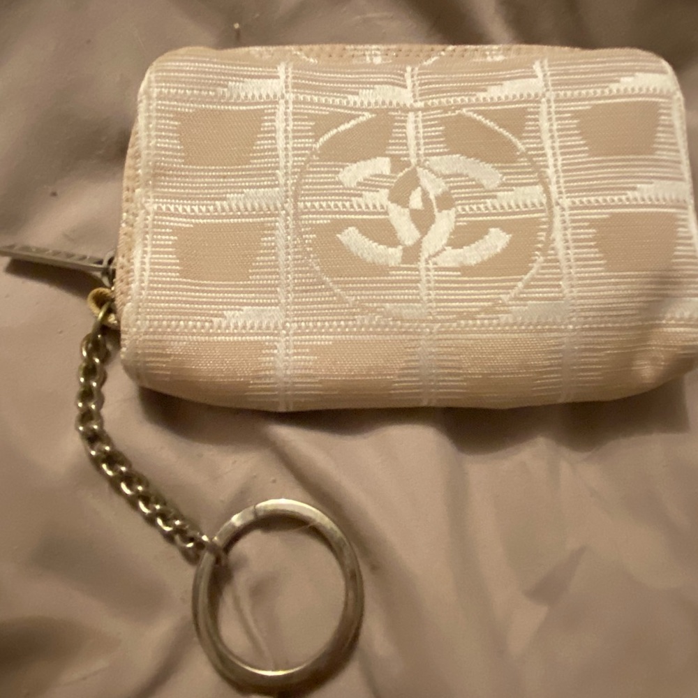Sold .   🤩.  Abby . Chanel pouch with key chain in great condition